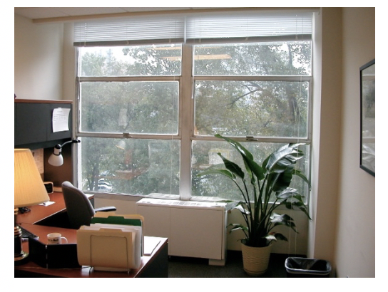 Figure 1 – Office with operable windows and view of trees (Source: Flickr drewsaunders http://www.flickr.com/photos/drewbsaunders/116533602/ ).
