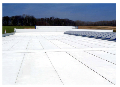 Figure 1 – Cool roof with a highly reflective acrylic top coat that helps reduce carbon emissions and lowers internal building temperatures. (Source: Design Build Network)